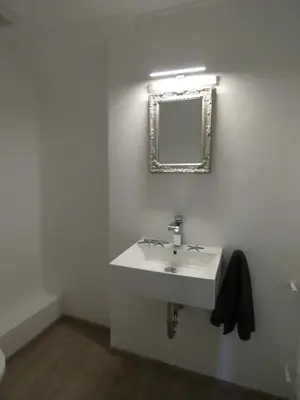 Ein Badezimmer in der Unterkunft Gartenwohnung JULIANA Gstadt LÄUFERs CHIEMSEE HOLIDAY HOME