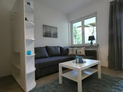 Ein Sitzbereich in der Unterkunft Gartenwohnung JULIANA Gstadt LÄUFERs CHIEMSEE HOLIDAY HOME