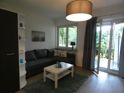 Ein Sitzbereich in der Unterkunft Gartenwohnung JULIANA Gstadt LÄUFERs CHIEMSEE HOLIDAY HOME