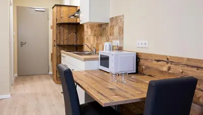 Küche/Küchenzeile in der Unterkunft Gästehaus - Boardinghouse Magnetsried