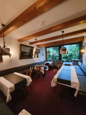 Ein Bett oder Betten in einem Zimmer der Unterkunft Gästehaus Alpenkranz