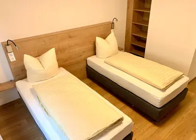 Ein Bett oder Betten in einem Zimmer der Unterkunft Creo München Süd
