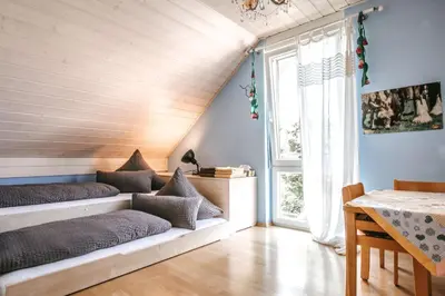 Ein Bett oder Betten in einem Zimmer der Unterkunft hirsch in pink - wohnen wie zuhause