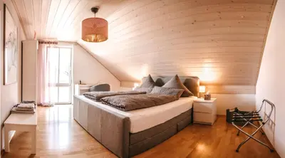 Ein Bett oder Betten in einem Zimmer der Unterkunft hirsch in pink - wohnen wie zuhause