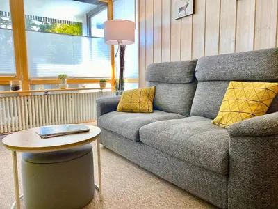 Ein Sitzbereich in der Unterkunft Ferienwohnung Kirchbichl am Schliersee mit Terrasse
