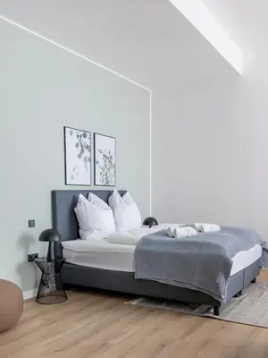 Ein Bett oder Betten in einem Zimmer der Unterkunft Limehome Rosenheim Gillitzerstraße