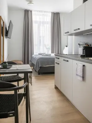 Küche/Küchenzeile in der Unterkunft Limehome Rosenheim Gillitzerstraße