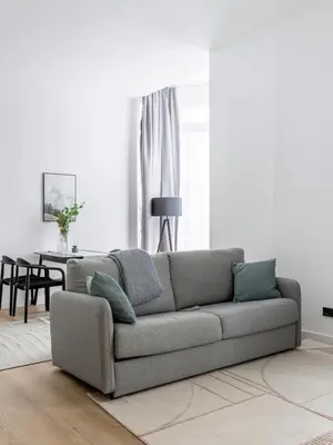 Ein Sitzbereich in der Unterkunft Limehome Rosenheim Gillitzerstraße