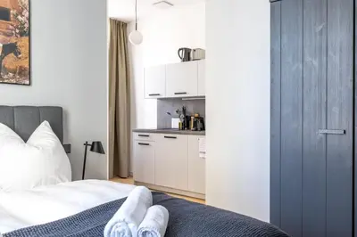 Ein Bett oder Betten in einem Zimmer der Unterkunft Limehome Rosenheim Gillitzerstraße