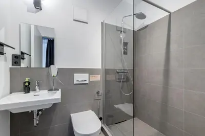 Ein Badezimmer in der Unterkunft Limehome Rosenheim Gillitzerstraße