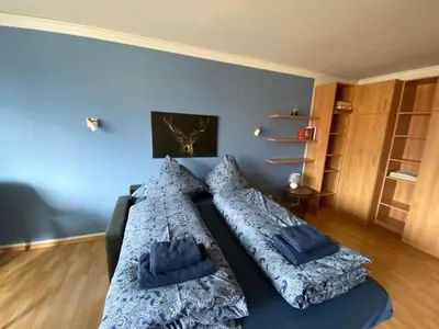 Ein Bett oder Betten in einem Zimmer der Unterkunft The Deer's Den