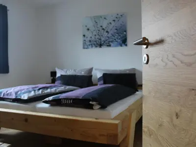 Ein Bett oder Betten in einem Zimmer der Unterkunft Ferienwohnung an der Jodquelle