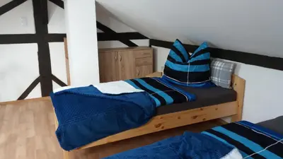 Ein Bett oder Betten in einem Zimmer der Unterkunft Fam.Singer