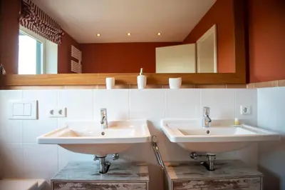 Ein Badezimmer in der Unterkunft Ferienhaus Seehof mit Sauna & offenem Kamin