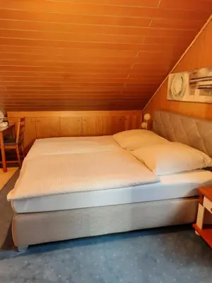 Ein Bett oder Betten in einem Zimmer der Unterkunft Privatzimmer in Augsburg-Haunstetten