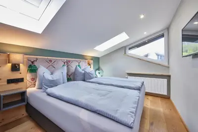 Ein Bett oder Betten in einem Zimmer der Unterkunft Ferienwohnung Reintal mit Sauna für 2-6 Personen 110 qm