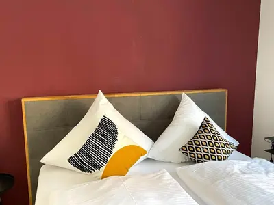 Ein Bett oder Betten in einem Zimmer der Unterkunft Ferienwohnung 