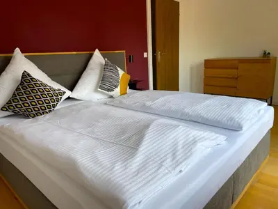 Ein Bett oder Betten in einem Zimmer der Unterkunft Ferienwohnung 