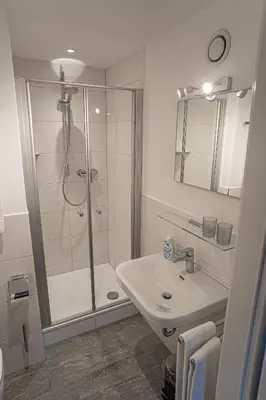 Ein Badezimmer in der Unterkunft Pension Sewald