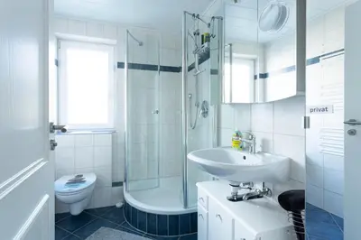Ein Badezimmer in der Unterkunft Kaminwohnung mit 24qm Südterrasse Nähe Zugspitze / Eibsee
