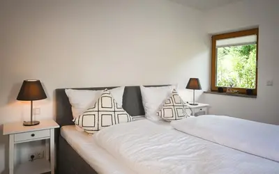 Ein Bett oder Betten in einem Zimmer der Unterkunft Apartment K13