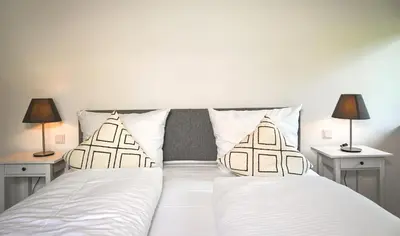 Ein Bett oder Betten in einem Zimmer der Unterkunft Apartment K13