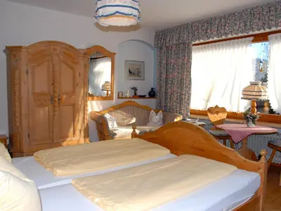 Ein Bett oder Betten in einem Zimmer der Unterkunft Gästehaus Gamsei - Bosch Hermann
