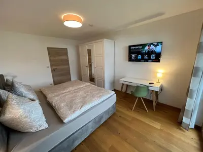 Ein Bett oder Betten in einem Zimmer der Unterkunft Beim Mühltaler