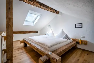 Ein Bett oder Betten in einem Zimmer der Unterkunft Naderbauer-Hof