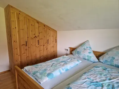 Ein Bett oder Betten in einem Zimmer der Unterkunft Haus Maier
