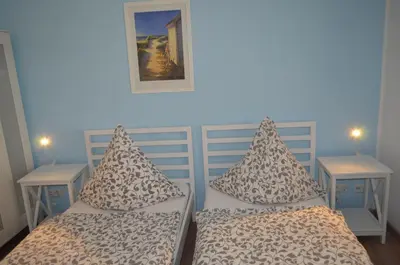 Ein Bett oder Betten in einem Zimmer der Unterkunft Unterkunft für Arbeiter und Monteure