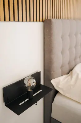 Ein Bett oder Betten in einem Zimmer der Unterkunft Schöne Designer-Wohnung im Mangfalltal