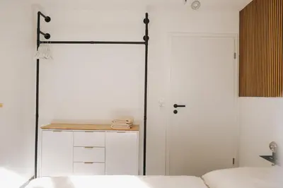 Ein Bett oder Betten in einem Zimmer der Unterkunft Schöne Designer-Wohnung im Mangfalltal