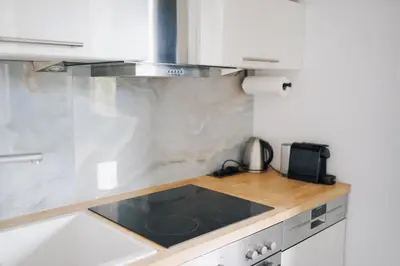 Küche/Küchenzeile in der Unterkunft Schöne Designer-Wohnung im Mangfalltal