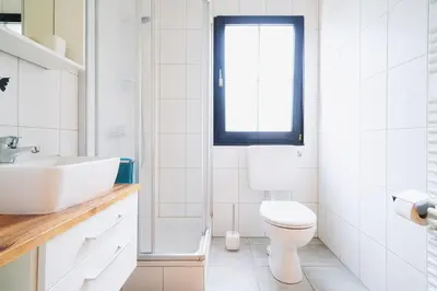Ein Badezimmer in der Unterkunft Ferienhaus Nr 4, Typ BE, Feriendorf Hochbergle, Allgäu