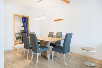 Ein Sitzbereich in der Unterkunft Ferienhaus Nr 4, Typ BE, Feriendorf Hochbergle, Allgäu