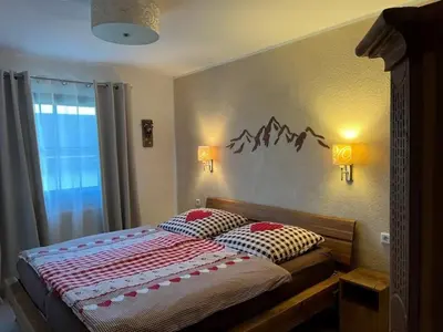 Ein Bett oder Betten in einem Zimmer der Unterkunft Ferienhaus Nr 100, Typ A, Feriendorf Hochbergle, Allgäu