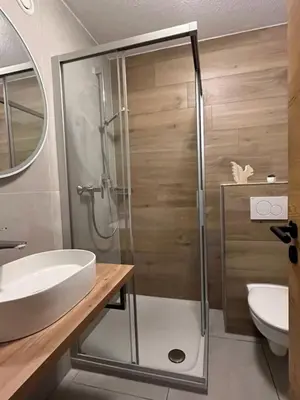 Ein Badezimmer in der Unterkunft Ferienhaus Nr 100, Typ A, Feriendorf Hochbergle, Allgäu