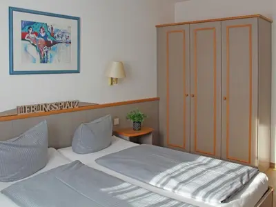 Ein Bett oder Betten in einem Zimmer der Unterkunft Ferienhaus Nr 102, Typ A, Feriendorf Hochbergle, Allgäu