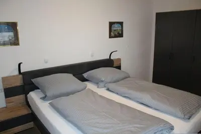 Ein Bett oder Betten in einem Zimmer der Unterkunft Ferienhaus Nr 134, Typ A, Feriendorf Hochbergle, Allgäu