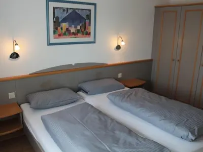 Ein Bett oder Betten in einem Zimmer der Unterkunft Ferienhaus Nr 38, Typ A, Feriendorf Hochbergle, Allgäu