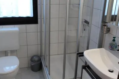 Ein Badezimmer in der Unterkunft Ferienhaus Nr 50, Typ E, Feriendorf Hochbergle, Allgäu