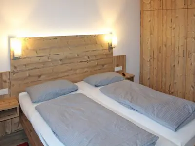 Ein Bett oder Betten in einem Zimmer der Unterkunft Ferienhaus Nr 27, Typ E, Feriendorf Hochbergle, Allgäu