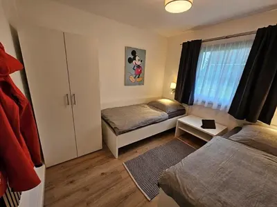 Ein Bett oder Betten in einem Zimmer der Unterkunft Ferienhaus Nr 96, Typ E, Feriendorf Hochbergle, Allgäu