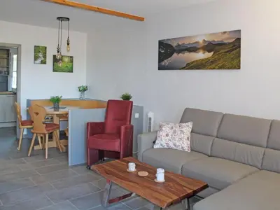 Ein Sitzbereich in der Unterkunft Ferienhaus Nr 80, Typ A, Feriendorf Hochbergle, Allgäu