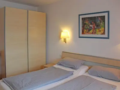 Ein Bett oder Betten in einem Zimmer der Unterkunft Ferienhaus Nr 46, Typ B, Feriendorf Hochbergle, Allgäu
