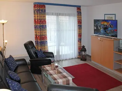 Ein Sitzbereich in der Unterkunft Ferienhaus Nr 28, Typ C, Feriendorf Hochbergle, Allgäu