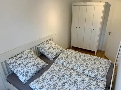 Ein Bett oder Betten in einem Zimmer der Unterkunft Ferienwohnung Lechglück