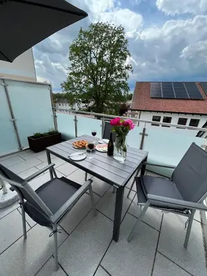 Ein Balkon oder eine Terrasse in der Unterkunft Traumhafte neue Dachterrassenwohnung am Soyener See