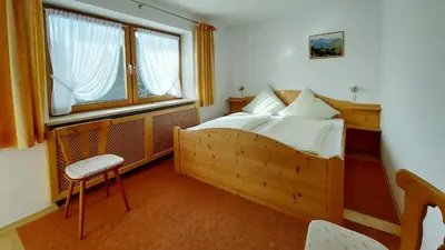 Ein Bett oder Betten in einem Zimmer der Unterkunft Ferienwohnung Nr 3, Lechbruck-Gründl, Allgäu
